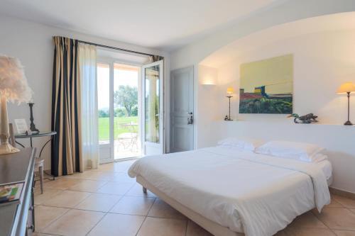 Hotel Villa Les Rosiers Grimaud Bagian luar foto