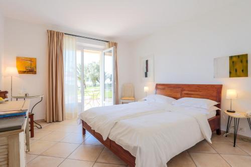 Hotel Villa Les Rosiers Grimaud Bagian luar foto